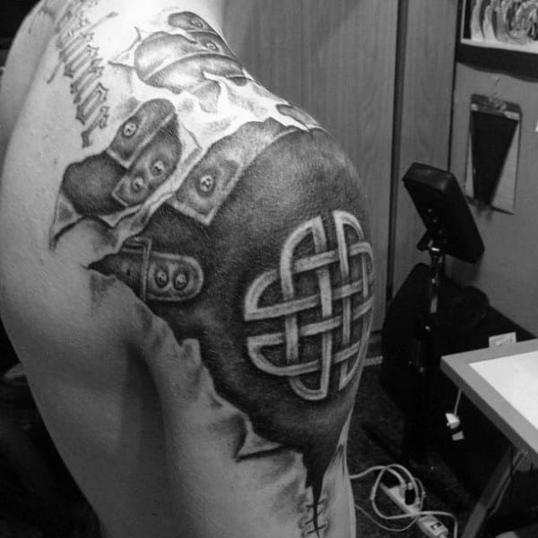 Ripped Skin Guys Celtic Knot Arm Tattoo With Blackwork Design