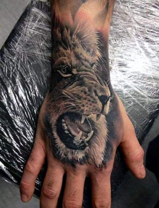 roaring-lion-male-hand-tattoos