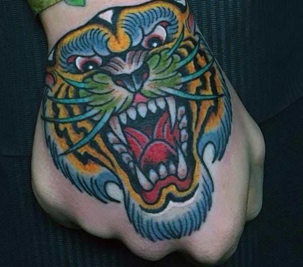 Roaring Tiger Traditional Mens Hand Tattoo