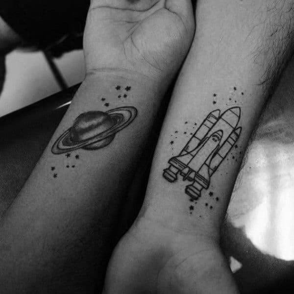 Rocket Ship With Saturn Matching Tattoos Couples
