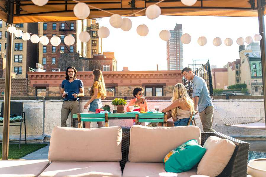 people having fun at rooftop bar