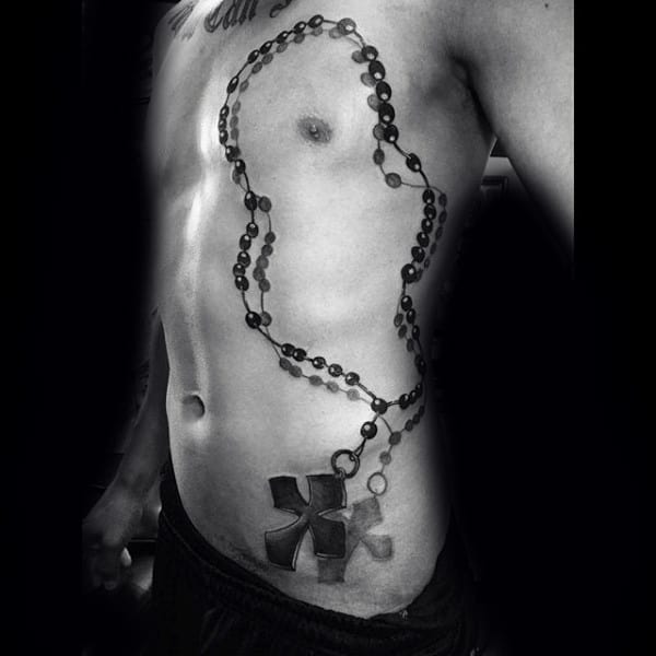 rosary-arm-tattoos-men-on-ribs