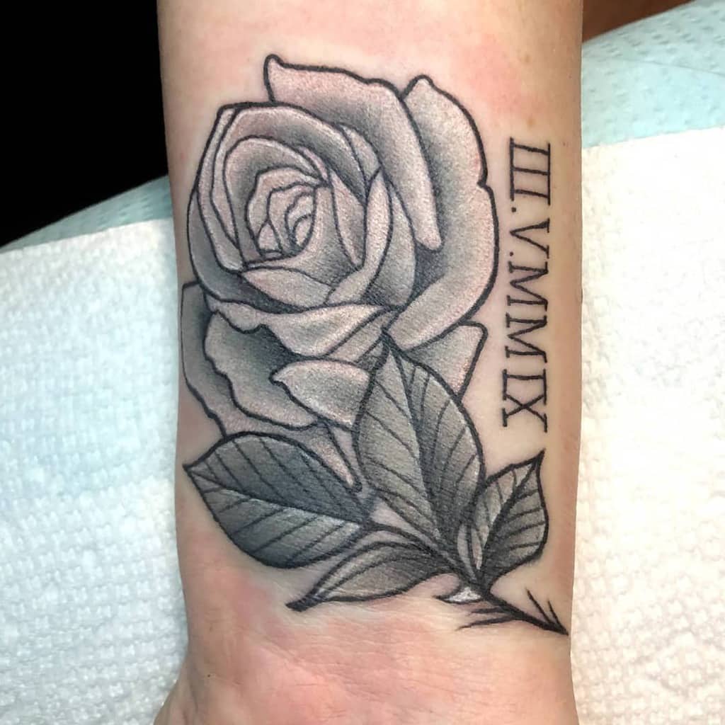 rose flower wrist tattoo bullettsinkshop