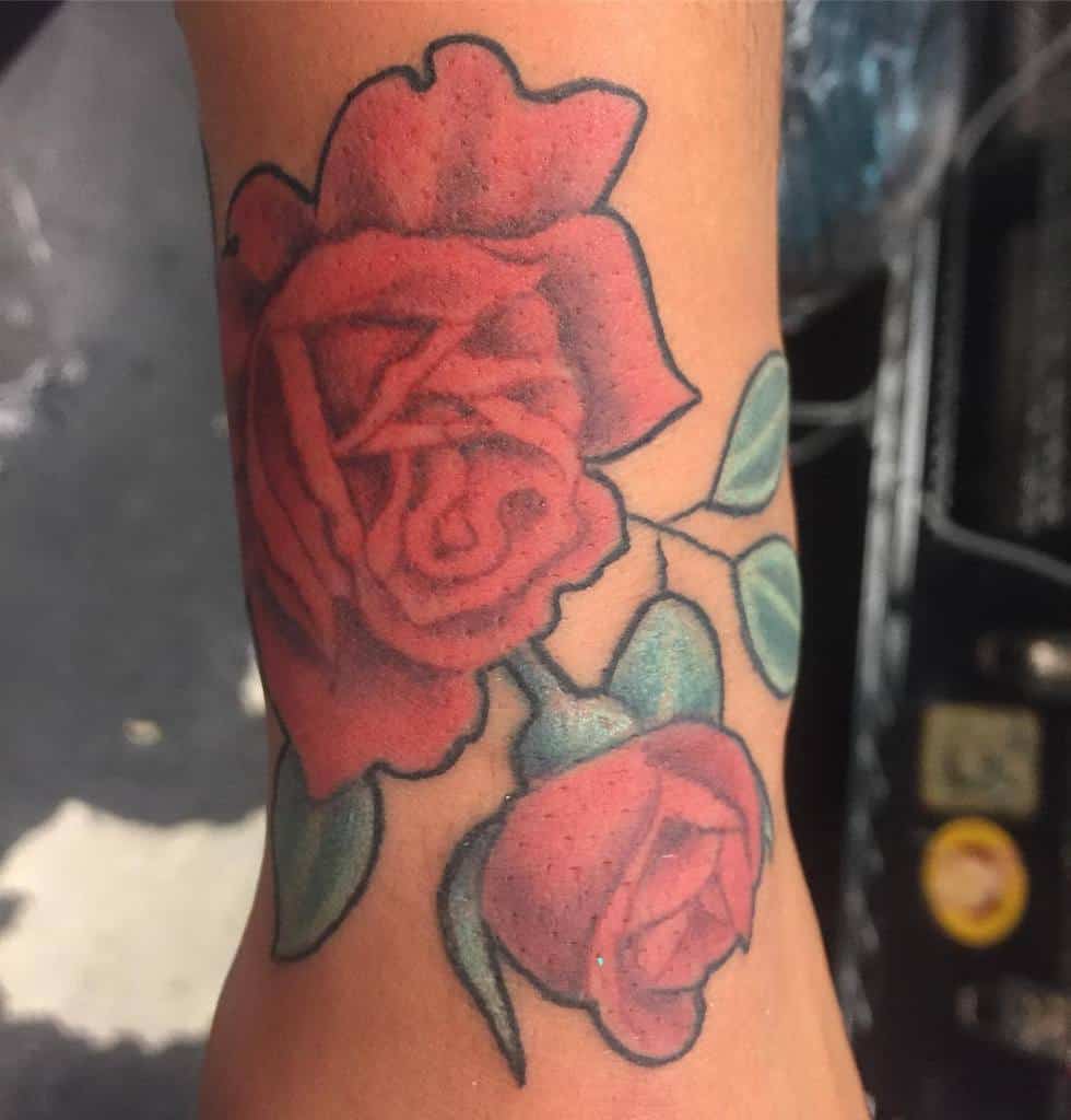 rose flower wrist tattoo mentortattooartist