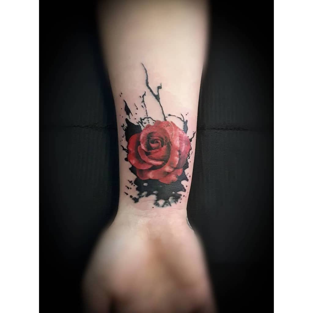 rose flower wrist tattoo mudmuddatattoo