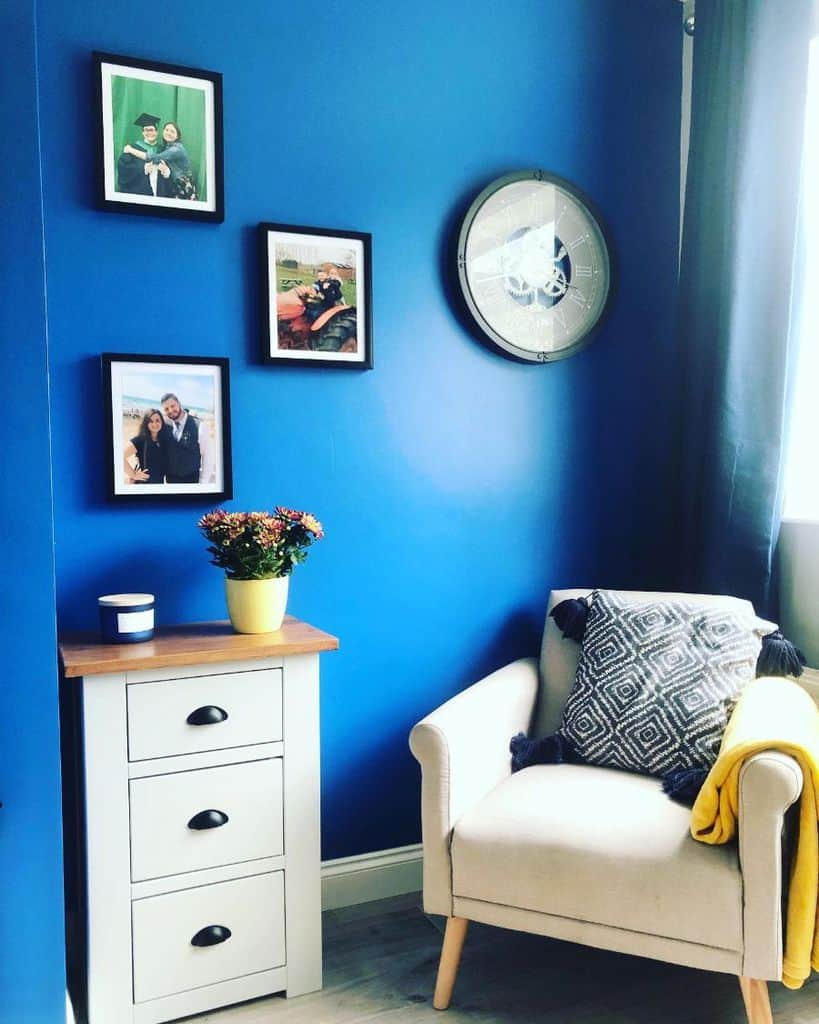royal blue feature wall living white furniture 