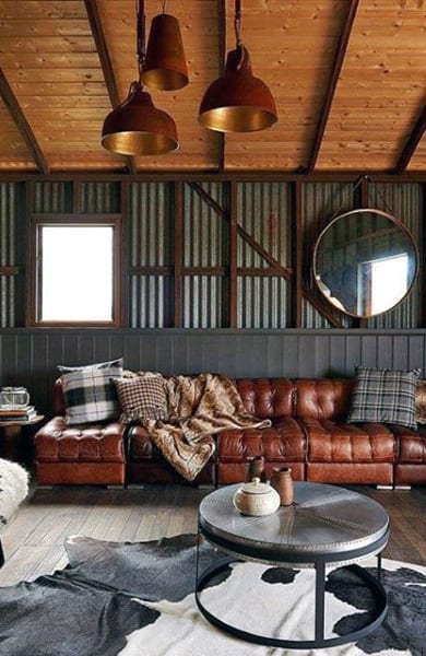 rustic living room with brown leather sofa