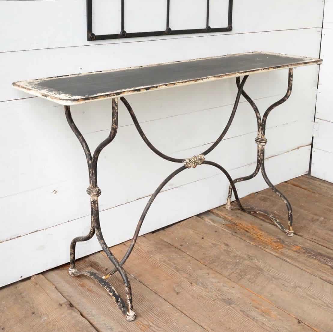 vintage cast iron table wood floor