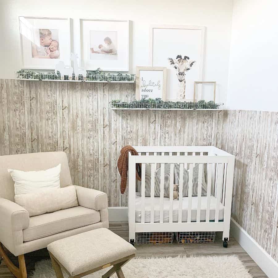 rustic nursery wood wall panels white crib sofa and footrest white floor rug 