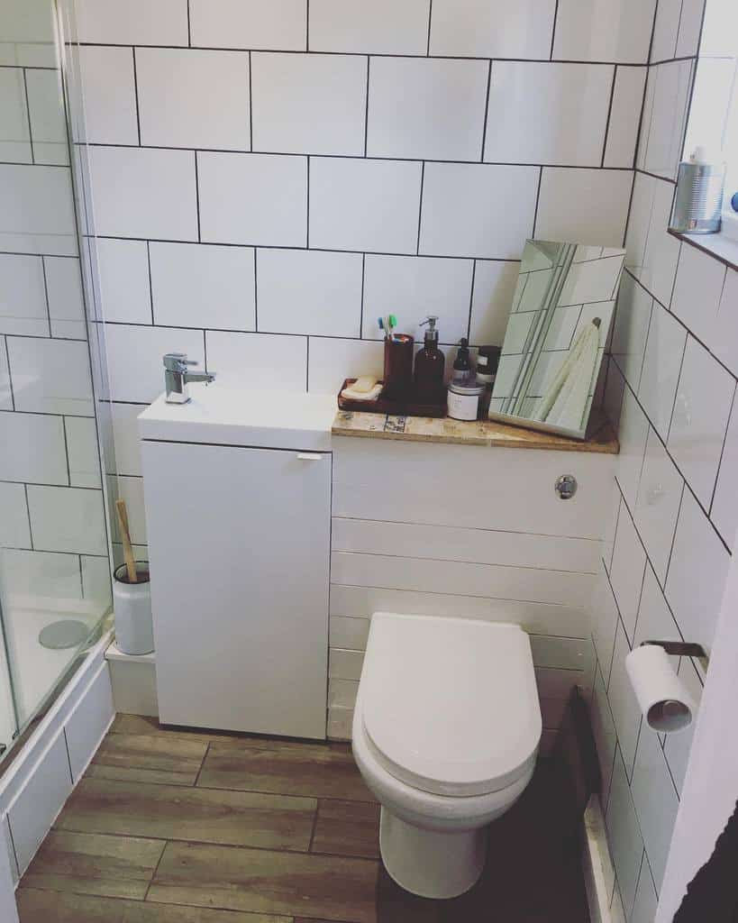 small white tile bathroom 