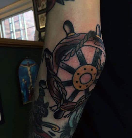 Sailor Jerry Elbow Tattoo For Guys With Ship Steering Wheel