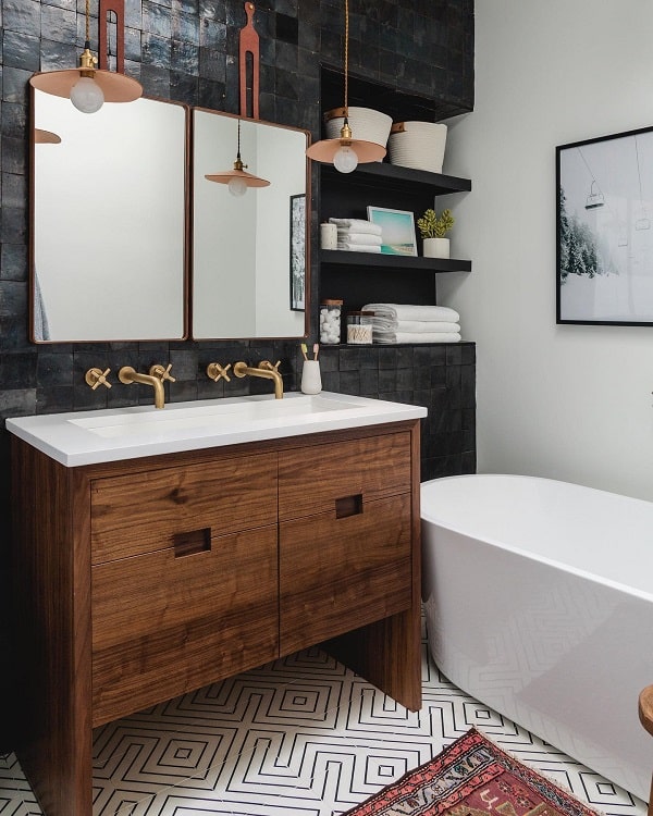 black and white bathroom with wood cabinets