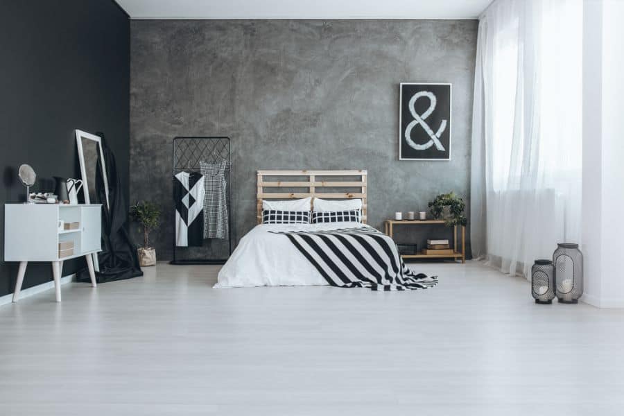 minimalist scandinavian black and white bedroom concrete wall