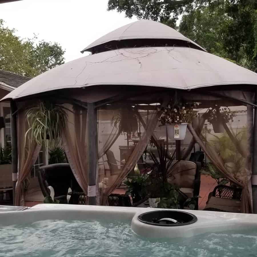 screened gazebo backyard spa