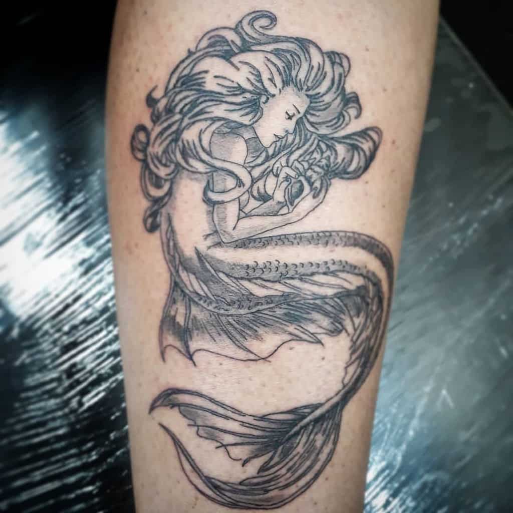 serene-ink-mermaid-tattoo-edu13tattoo