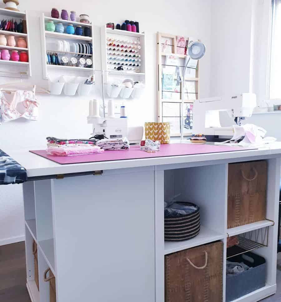 home sewing room with wall storage and under counter space