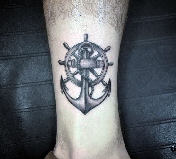 shaded anchor with ship wheel small mens lower leg tattoo ideas