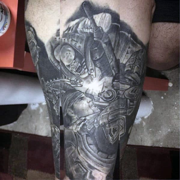Shaded Black And Grey Gears Of War Video Game Scene Mens Leg Tattoos