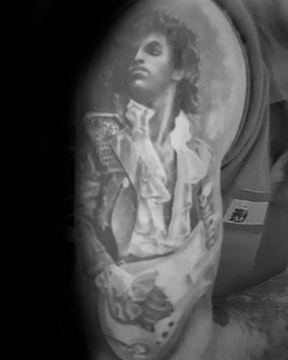 Shaded Black And Grey Half Sleeve Prince Tattoos For Gentlemen