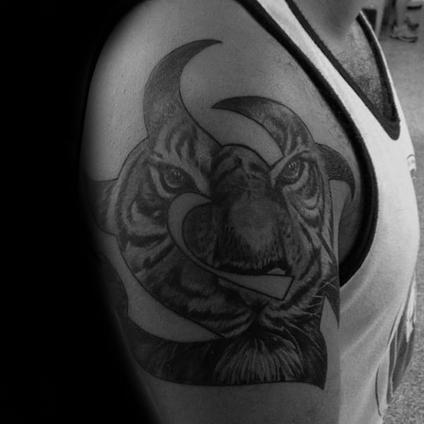 Shaded Black And Grey Ink Male Tribal Tiger Upper Arm Tattoos