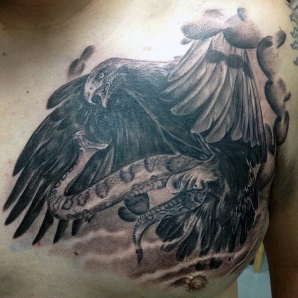 Shaded Black And Grey Ink Mexican Eagle Tattoo On Guys Upper Chest