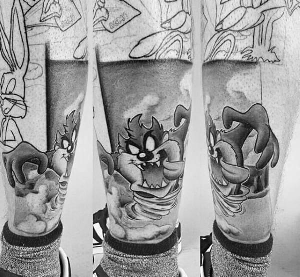 Shaded Black And Grey Ink Tasmanian Devil Looney Tunes Guys Tattoos On Lower Leg