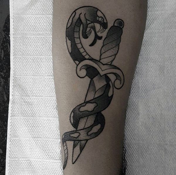Shaded Black And Grey Ink Traditional Snake And Dagger Forearm Tattoos For Men