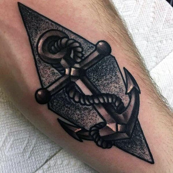 shaded black and grey mens small inner forearm anchor tattoo