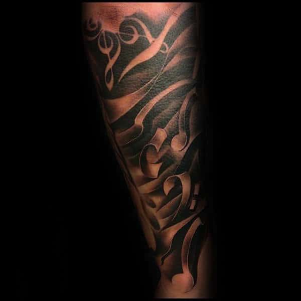 Shaded Black And Grey Music Note Tattoo Sleeve On Male