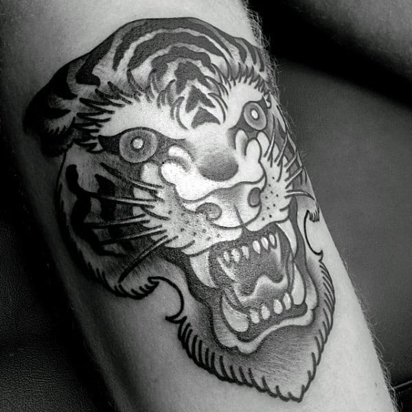Shaded Black And Grey Tattoo Of Tiger On Man With Traditional Design