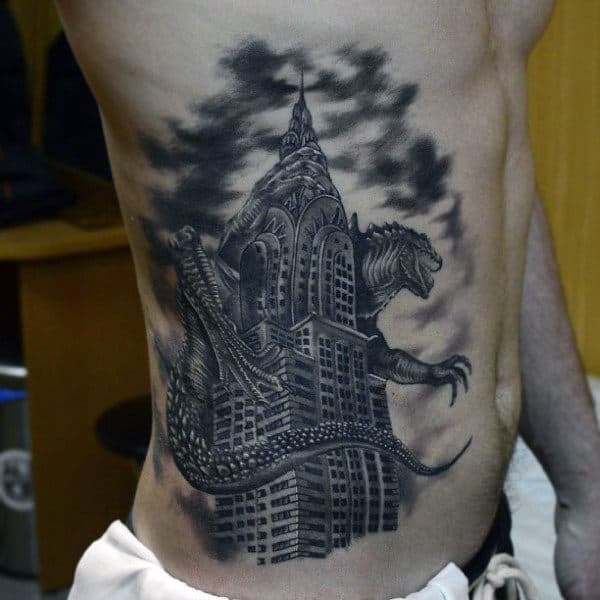 Shaded Blackwork Tattoo Of Godzilla Crushing Skyscraper On Mans Side