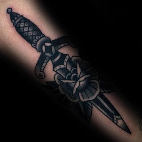 Shaded Dark Grey And Black Ink Male Forearm Traditional Dagger And Rose Tattoo Designs