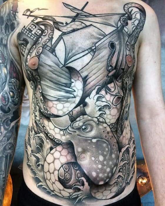 shaded-japanese-octopus-with-sailing-ship-mens-chest-tattoo