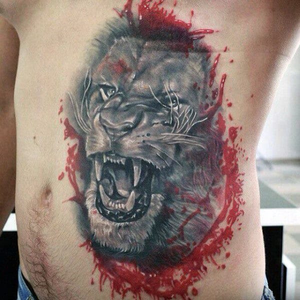 Shaded Lion Rib Cage Tattoo With Watercolor Red Ink On Man