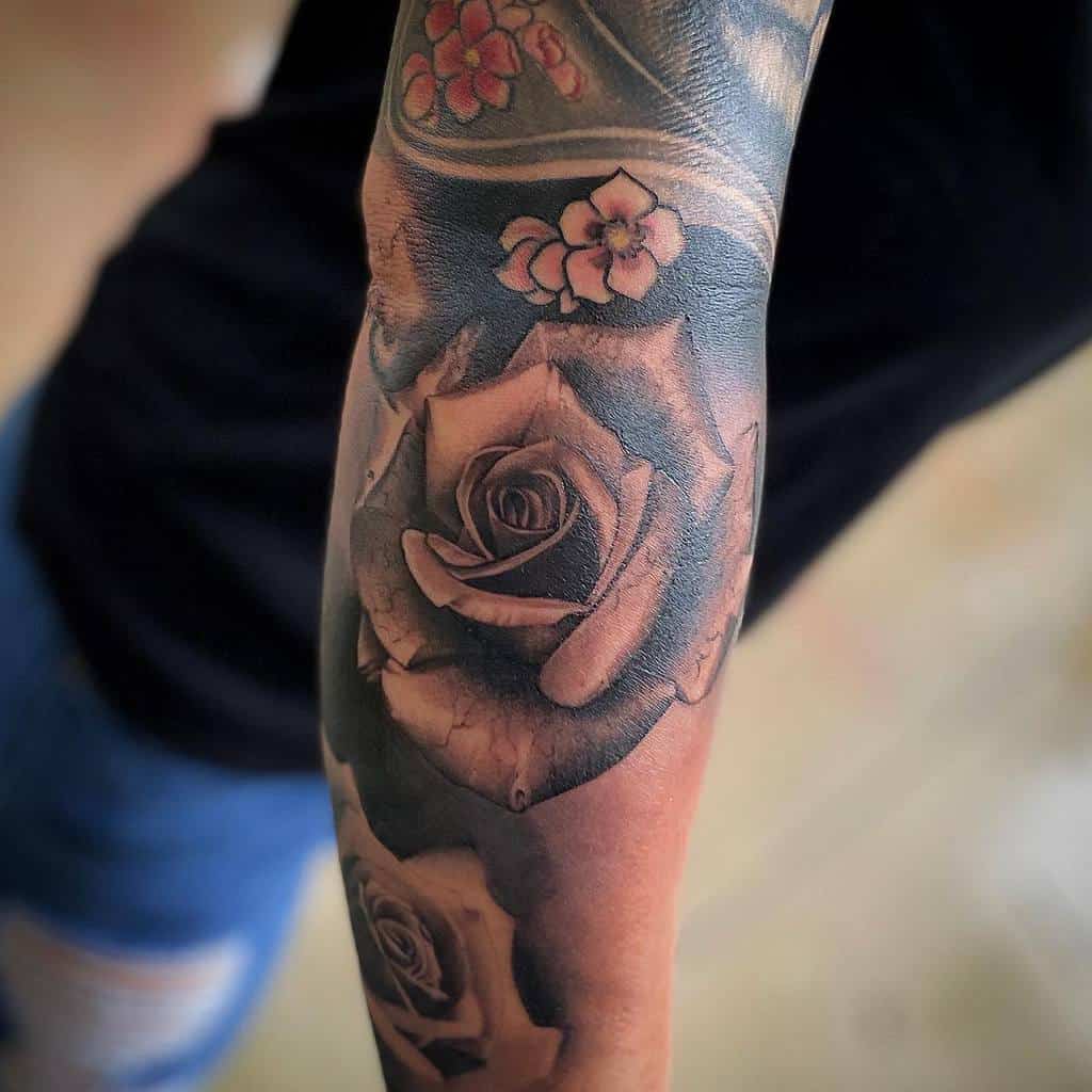 shaded rose sleeve tattoos gifv