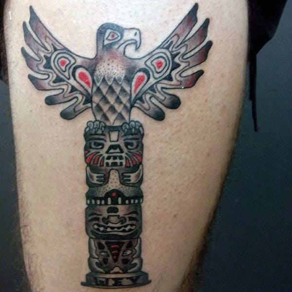 Shaded Traditional Totem Pole Eagle Tattoo On Calf On Gentleman