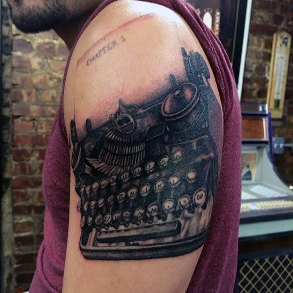 Shaded Typewriter Upper Arm Tattoo On Male