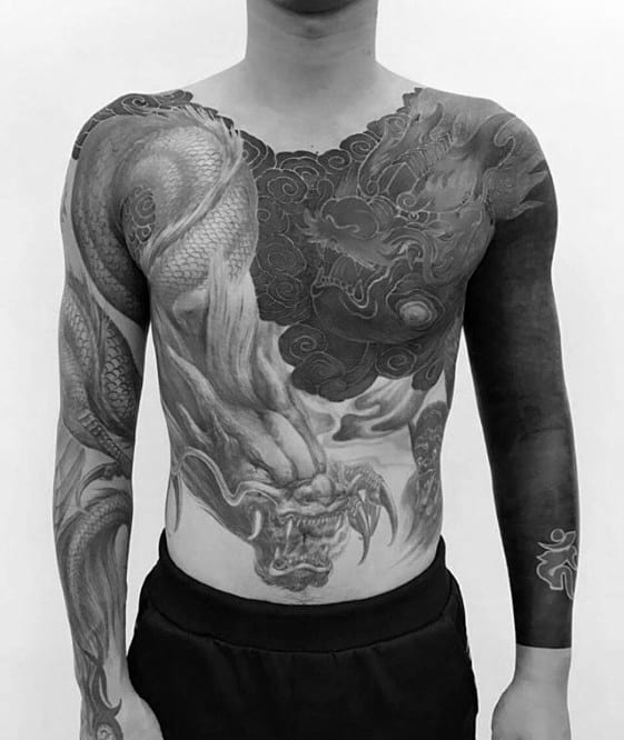 Sharp Blackout Sleeve Dragon Themed Male Tattoo Ideas