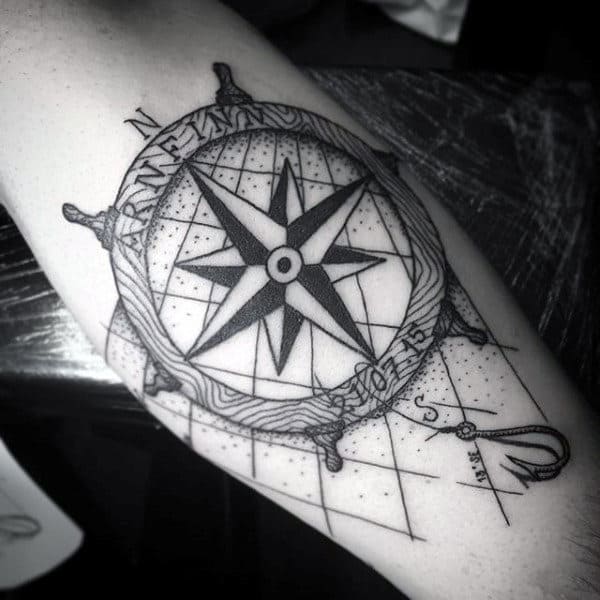 Ship Steering Wheel With Nautical Star And Simple Fish Hook Tattoo For Men On Inner Forearm