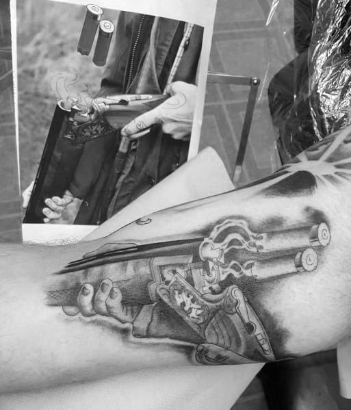 Shotgun Ejecting Smoking Shells Mens Arm Tattoo With 3d Design.