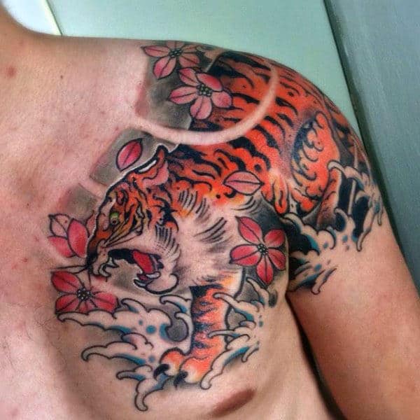 Shoulder And Chest Japanese Tiger Splashing In Water Tattoo On Gentleman