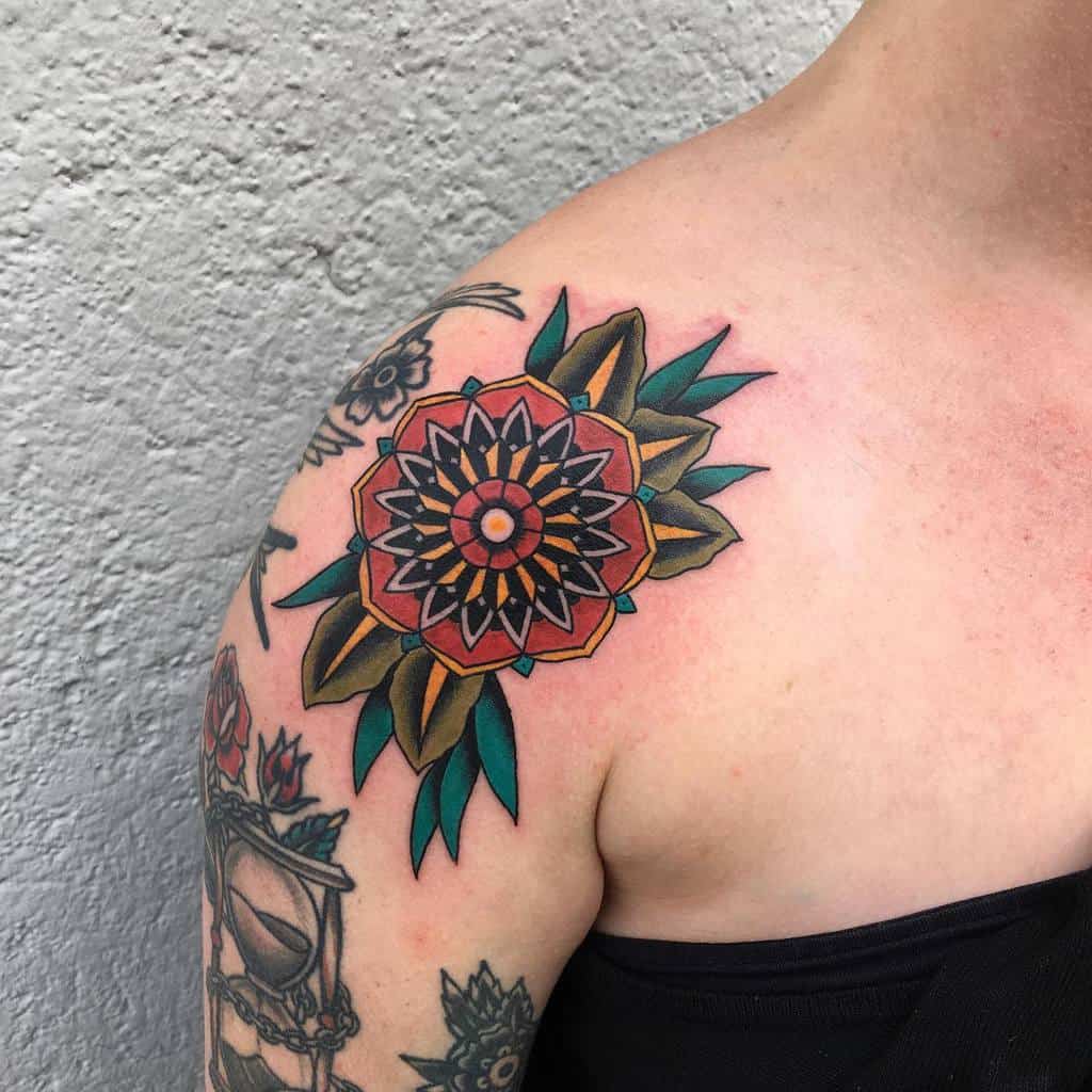 shoulder geometric flower tattoo ben.hubler