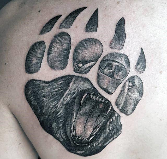 Shoulder Male Bear Roaring Inside Of A Claw Tattoo