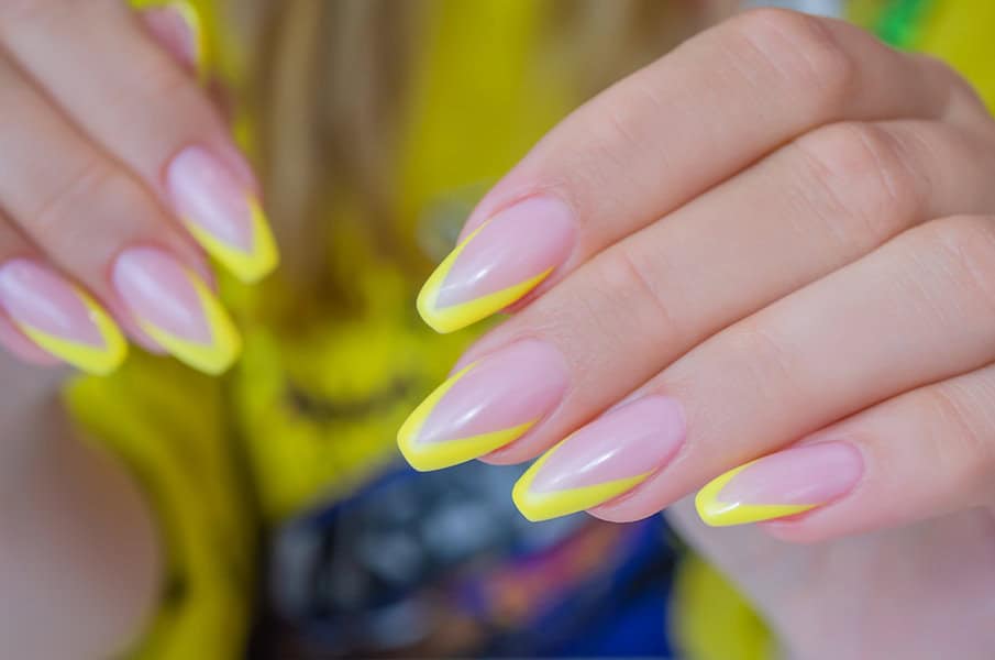 Yellow French manicure nails