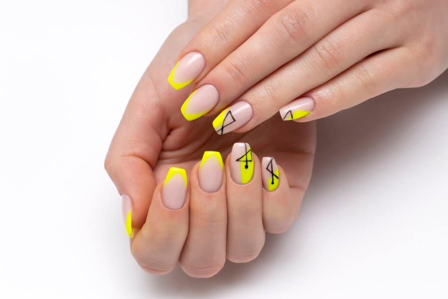 Yellow geometric nail art design
