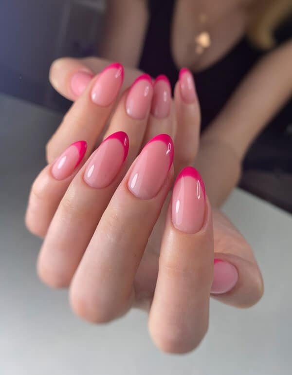Glossy pink French nails