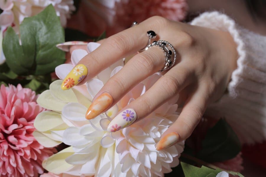 Floral and marble nail art close-up