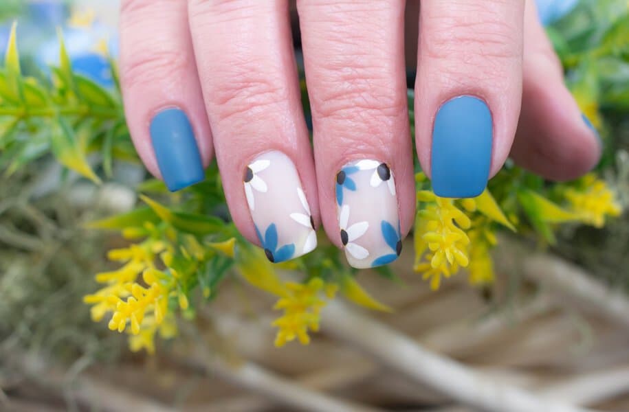 Blue matte and floral nail design