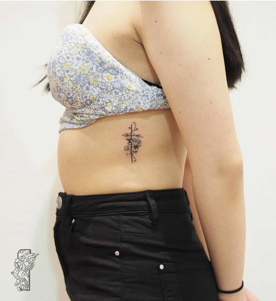 side cross tattoos for women jen_urchin