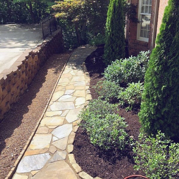 flagstone walkway with landscape